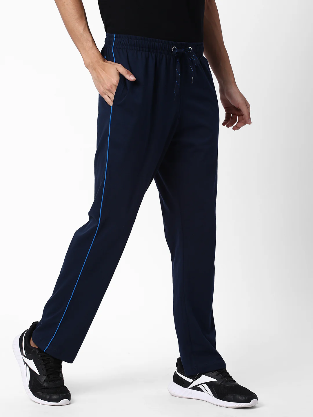 A pair of navy blue athletic pants with an elastic waistband and a drawstring, featuring a thin blue stripe along the sides, designed for comfort and flexibility during physical activity.