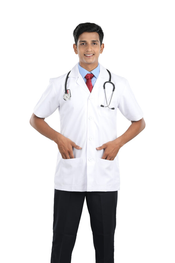 A smiling male doctor in a white coat with a red stethoscope.