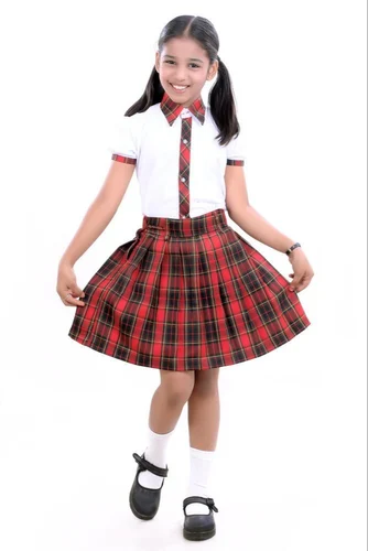 A school dress featuring a white shirt with a red and black plaid skirt, designed for a youthful and stylish school uniform.