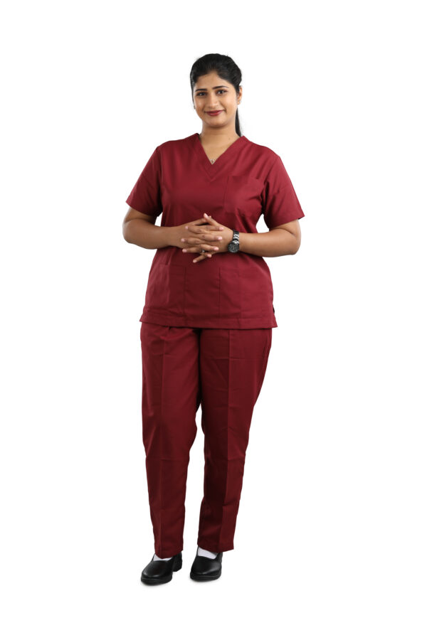 Maroon full sleeve scrub suit with V-neck top, chest pocket, and matching pants, designed for medical professionals for comfort, flexibility, and all-day wear.
